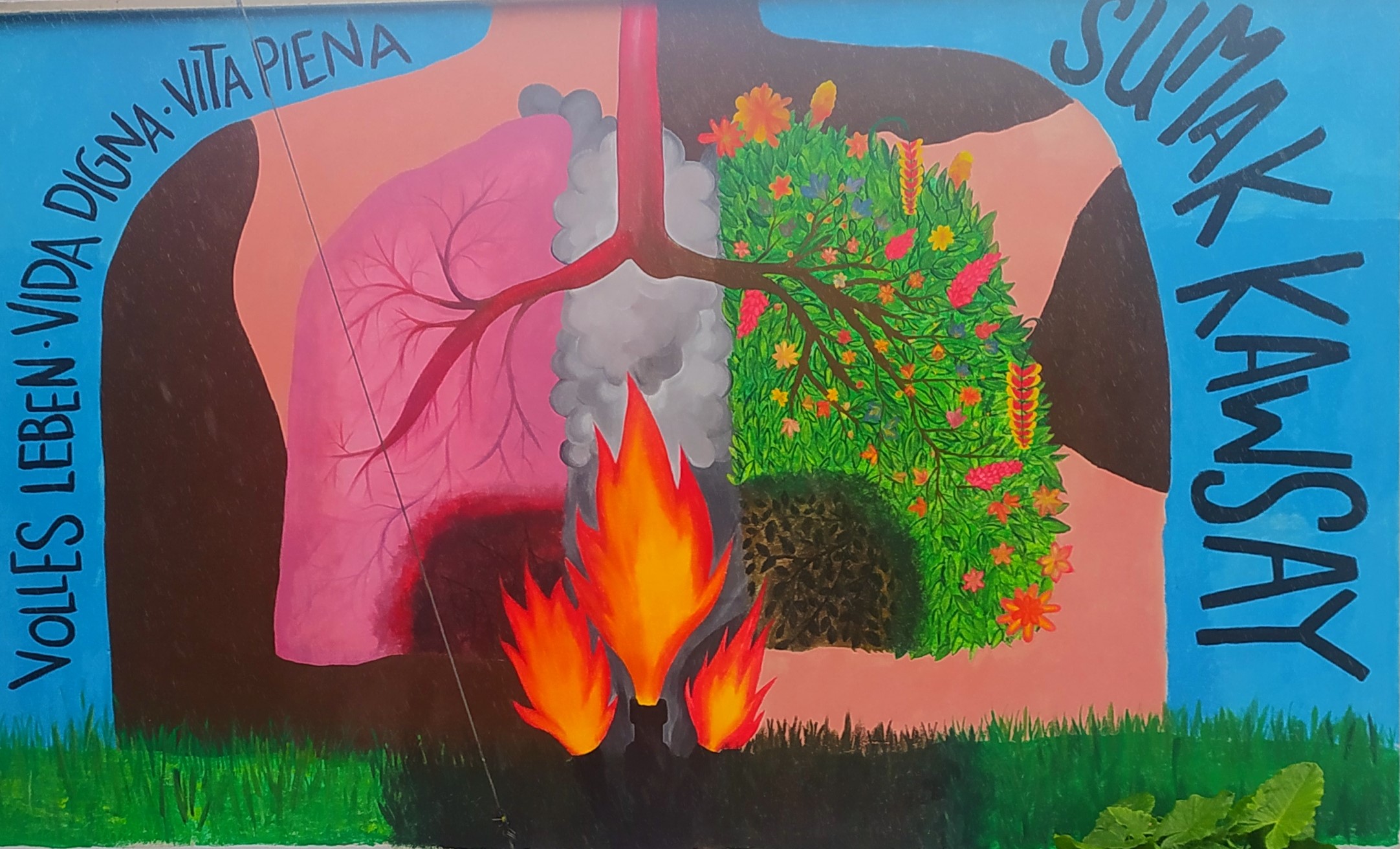 Ein Kunstwerk in der Siedlung zeigt das Prinzip "Sumak Kawsay", und verbildlicht dessen Bedrohung durch die Erdölindustrie.